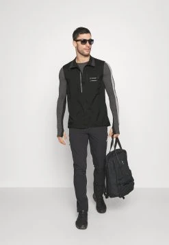 Norrøna Senja Vest - Waistcoat - Black -Norrøna Shop 46337087e7af4490a1a6546f9c026bbc