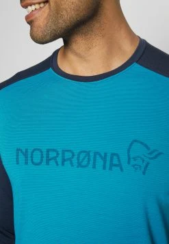 Norrøna Falketind Equaliser Round Neck - Long Sleeved Top - Hawaiian Surf/Indigo Night -Norrøna Shop 93ff6796d2244031a5cb1e63e87cbd6f