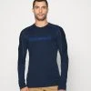 Norrøna Falketind Equaliser Round Neck - Long Sleeved Top - Indigo Night -Norrøna Shop dc4551336137405cb9e32f567437f770