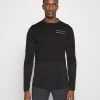 Norrøna Senja Equaliser Lightweight Long Sleeve - Long Sleeved Top - Caviar -Norrøna Shop f4933fee8f8b4280a7d09955e9d4d447