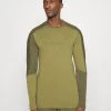 Norrøna Falketind Equaliser Round Neck - Long Sleeved Top - Khaki -Norrøna Shop f7b20e46597249f2a5dc4f395e8fb1fe