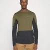 Norrøna Senja Equaliser Lightweight Long Sleeve - Long Sleeved Top - Olive/Night -Norrøna Shop f8ff764688a3467393e8b46b33cdafc4